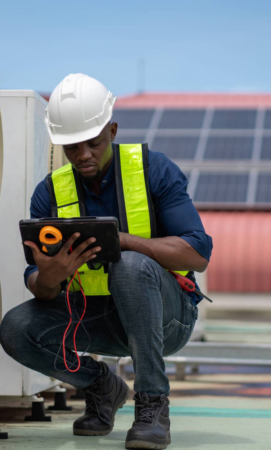 Engineers inspecting the air conditioning system in a large building or industrial facility.